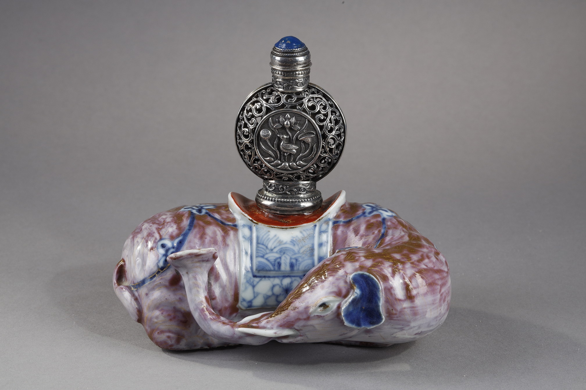 Elephant figure lying in porcelain